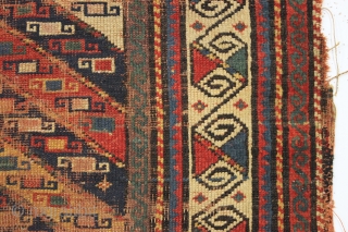 early kazak prayer rug with an unusual mihrab and a very attractive main border. As found, very, very dirty with low pile and scattered damage a shown. Unclear inscribed date. All good  ...