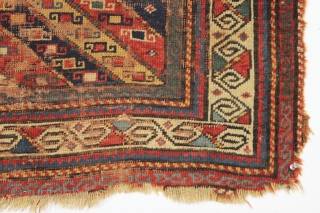 early kazak prayer rug with an unusual mihrab and a very attractive main border. As found, very, very dirty with low pile and scattered damage a shown. Unclear inscribed date. All good  ...