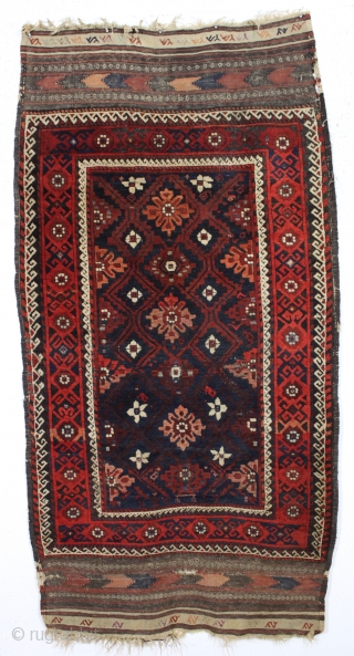 antique baluch rug with an interesting design and absurdly long kelim ends. Recent New England find. a very unusual combination of mina khani elements. As found, very dirty with mostly thick long  ...