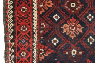 antique baluch rug with an interesting design and absurdly long kelim ends. Recent New England find. a very unusual combination of mina khani elements. As found, very dirty with mostly thick long  ...