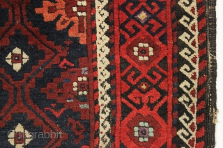 antique baluch rug with an interesting design and absurdly long kelim ends. Recent New England find. a very unusual combination of mina khani elements. As found, very dirty with mostly thick long  ...