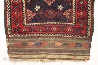 antique baluch rug with an interesting design and absurdly long kelim ends. Recent New England find. a very unusual combination of mina khani elements. As found, very dirty with mostly thick long  ...