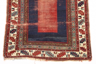 antique kazak rug with an entrancing minimalist field. Recent New England find, very dirty with overall wear, creases and slight end unraveling. Still, an object of some beauty. Good colors, good age.  ...