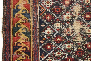 antique very small caucasian shirvan rug with an unusual design and a lovely yellow border. Very fine weave. Supple, cloth like handle. As found, with mostly even tight pile, some scattered wear  ...