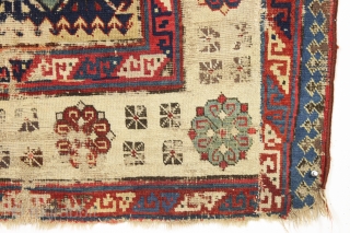 Early caucasain talish type rug with a few condition issues. Cut and shut across the center. Heavy wear, corrosion, tears, holes, and more. Not for everyone. Reasonably clean. Mid 19th c. or  ...