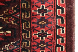 Antique yomud chuval. Strong large scale drawing. Very unusual palette with intense but all natural colors. Mostly good thick pile. a bit of wear and a tiny old moth nibble. Original blue  ...