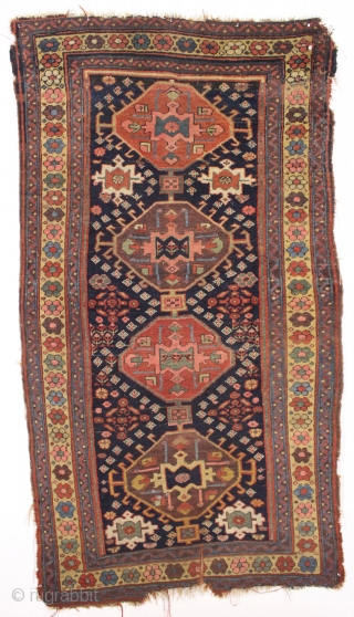 antique northwest persian or kurdish rug. As found, very very dirty but mostly good pile and beautiful all natural colors. Old moth damage in top right corner and a  spot of  ...