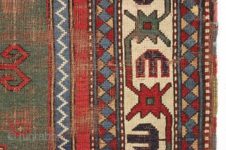 Early kazak prayer rug with true green field. Archaic field elements and bold eye catching ivory border. All good natural colors featuring a beautiful old green, a fine red, multiple blues and  ...