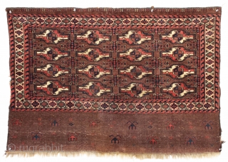 Antique yomud chuval with an interesting skirt panel. All good colors. Mostly good even low pile. Sides a bit rough. No field repairs. Reasonably clean. Lots of guls but not lots of  ...