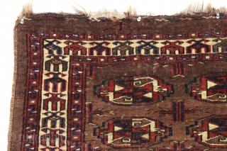Antique turkoman chuval. Dark and strange but I find it oddly attractive. I like the border. Mostly decent low pile as shown. Unusual pallete but all natural, no dye run. Original back.  ...