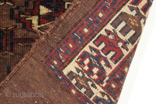 Antique turkoman chuval. Dark and strange but I find it oddly attractive. I like the border. Mostly decent low pile as shown. Unusual pallete but all natural, no dye run. Original back.  ...