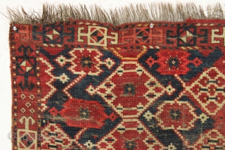 Antique ersari chuval. Large scale ikat inspired field design with a bold boreder and interesting elem panel. All natural colors. Bristly warps, probably goat hair. Creases, sewn tears, wear and assorted roughness  ...