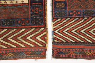 antique pair of northwest persian or kurdish bagfaces. Rare to find an original and interesting pair with unusual designs featuring eye catching skirt panels. From a New England home. Washed and clean.  ...