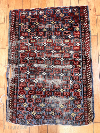 Out of the cedar chests. Early diminutive Caucasian rug with an unusual field. Great old colors. Kuba? Zeichour? Truly non commercial. Far from perfect condition. Mid 19th c. 32” x 46”  
