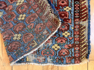 Out of the cedar chests. Early diminutive Caucasian rug with an unusual field. Great old colors. Kuba? Zeichour? Truly non commercial. Far from perfect condition. Mid 19th c. 32” x 46”  