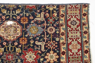 Antique large caucasian carpet fragment. Older afshan or blossum carpet type design with nice red kufic border. All vibrant natural colors. Mostly good even low pile. Small damaged area as shown, scattered  ...