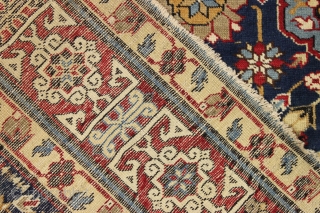 Antique large caucasian carpet fragment. Older afshan or blossum carpet type design with nice red kufic border. All vibrant natural colors. Mostly good even low pile. Small damaged area as shown, scattered  ...