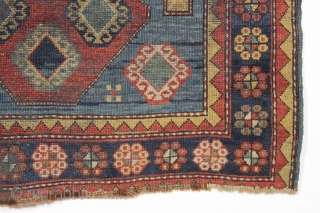 Antique kazak rug. Striking design and colors. "New England condition", in other words, very poor condition with very low pile, heavy wear and as dirty as they come. Who knows what will  ...