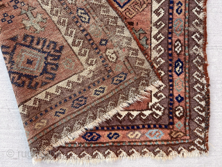 Yet another Baluch from the cedar chests. Acquired many years ago. I liked the archaic wildness. not in great condition but has presence non the less. 
Good age. Well into the 19th  ...