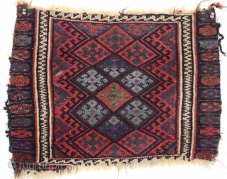 Antique kurd bagface fragment with extra nice design and fine natural colors. Good even low pile with nice tight weave. Charming little weaving. 19th c. 17" x 22"      ...