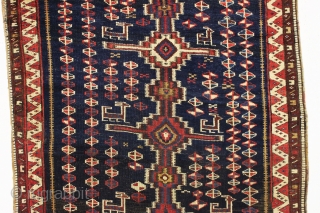 Antique Persian tribal rug, probably Luri, with an unusual flat weave inspired design. Beautiful all natural colors. Overall good condition with even pile. Interesting deep indigo ground with lines of natural brown  ...