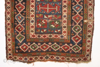 interesting older kazak rug with an unusual design and splendid colors. Eye catching main border. All natural colors featuring beautiful old greens. Appears to have a fair amount of natural dark wool  ...