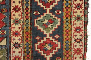 interesting older kazak rug with an unusual design and splendid colors. Eye catching main border. All natural colors featuring beautiful old greens. Appears to have a fair amount of natural dark wool  ...