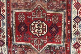 antique east anatolian kurdish long rug. Good older example of a classic type. In fair condition with much good thick pile combined with an almost completely corroded ground. All natural colors. Edges  ...