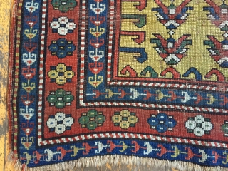 Wayne Barron 
Antique yellow ground Kazak prayer rug. Interesting design. As found, very dirty with wear and damage as shown. All natural colors.  Dated? 19th c. 3'2" x 4'9"
   