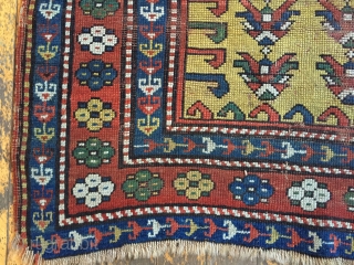 Wayne Barron 
Antique yellow ground Kazak prayer rug. Interesting design. As found, very dirty with wear and damage as shown. All natural colors.  Dated? 19th c. 3'2" x 4'9"
   