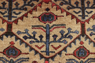 antique nw persian or kurdish camel ground rug. Interesting slightly eccentric variation of classic shrub design. Mostly good thick pile, couple small hard to see old sewn up spots. Good colors. Clean.  ...