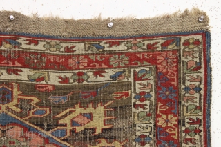 Antique caucasian kuba soumak long rug. Great yellows and greens. Original sides and end finish. The heavily oxidized brown ground has areas poorly filled in and should be restored. The design elements  ...