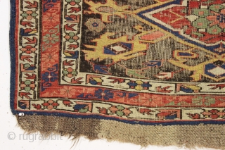 Antique caucasian kuba soumak long rug. Great yellows and greens. Original sides and end finish. The heavily oxidized brown ground has areas poorly filled in and should be restored. The design elements  ...