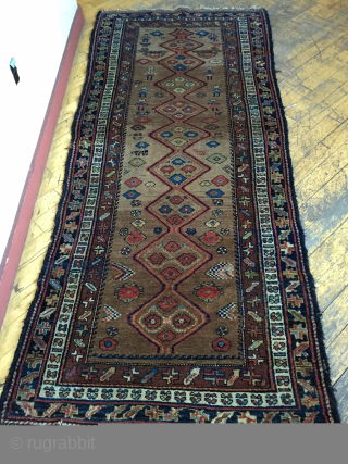 Antique kurdish long rug in good condition with charming little people and animals. Beautiful camel ground and all natural colors. Good thick overall pile and nice tight weave. i don't see any  ...