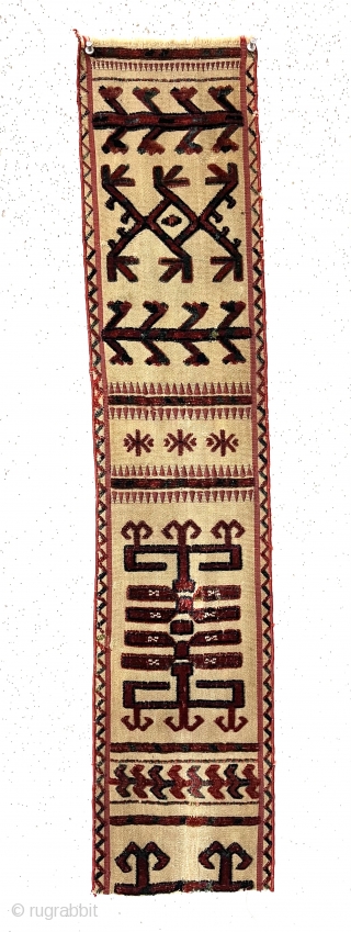 Antique Turkman tent band fragment. Attractive little example. All good natural colors featuring pretty medium blues. Mostly good condition other than the obvious crude repair in the lower medallion. Edges rewrapped. 19th  ...