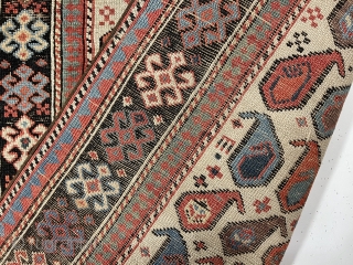 Antique Caucasian akstafa prayer rug from a New England home. Beautiful ivory ground example with all natural colors and good pile. Lovely purples, greens, light blues and of course the pretty akstafa  ...