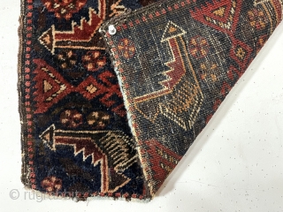  
Antique little Baluch bagface, sistan I believe. As found, original host hair selvages and top end flat weave with loops. Lower end has guard border tightly cropped with later added cord.  ...