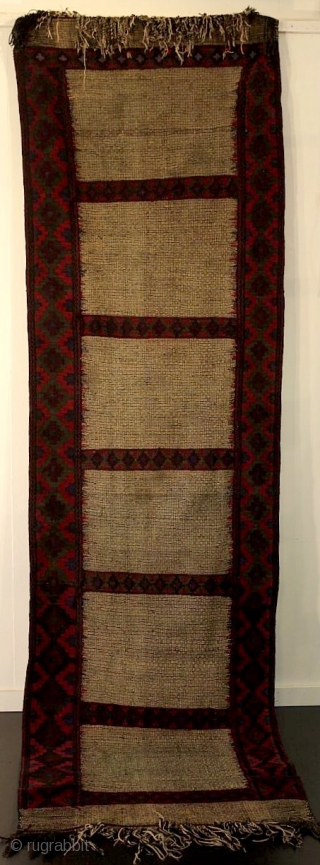 C141. Long sofre. Collected Afghanistan, but unknown origin. The field weave is unique - we've never seen it before. The border could be north or south Afghanistan. Mostly warp wrap kilim, but  ...