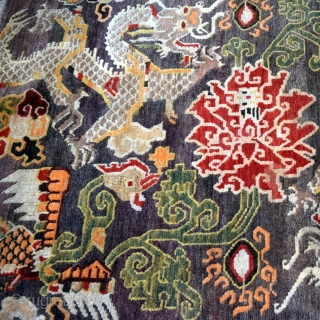 This is an exquisite vintage Tibetan rug which is approximately 50 years old. The rug was hand knotted on a traditional wooden loom using age-old techniques and 100% natural dyes. It was  ...