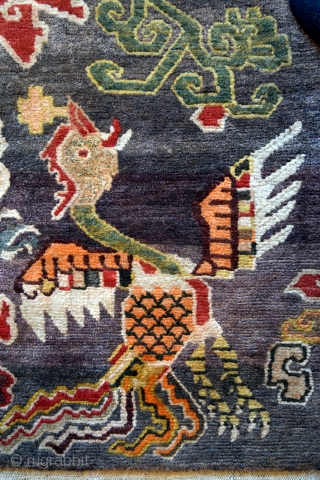 This is an exquisite vintage Tibetan rug which is approximately 50 years old. The rug was hand knotted on a traditional wooden loom using age-old techniques and 100% natural dyes. It was  ...