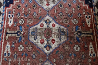 South Persian Nomad rug, 180x113 cm, probably region Kohgilujeh, Ghaschghai or Luri-weavers.
Both the use of brown uncolored weft, shimmering through the pile, as the total absence of any chemical testify great age.  ...