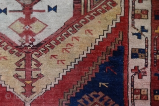 Konya Karapinar Fragment, 170x132 cm. Attached to linen. This damaged and worn 19th c. fragment is remarkable because of the uniqueness of the central emblem, from Turkoman origins.     