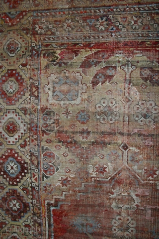 18th century Konya rug,W/W,225x110 cm.
Numerous repilings, inserts, loss of the small lateral outer borders. A unique central axis design that devides the entire field and incorporates the medaillon.     