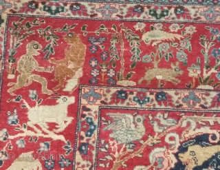 Persian Dragon rug, 187/145 cm.,19thC.Attributable either to Kirman(Kerman) because of the deep'Bordeaux'red, or to Isfahan because of the dragon and animal phantasies. This thin and exquisite rug has survived well due to  ...