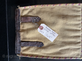 I believe an interesting Persian bag or pouch 7" x 9". The individual is a Sufi or Dervish. He is identified by his hat and begging bowl and sitting on a leopard  ...