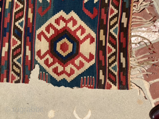Here is an unusually sized kilim 6’8” x 12’7” it’s one piece not two and I very good condition. Note a few small nips in border. Has good age and ...