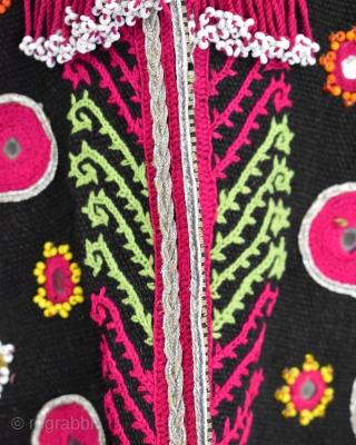 A rare find - Wedding coat from the Mangal - Pashtun tribal people of Khost province , Afghanistan

Wonderfully embroidered with a central protective amulet in gold thread on the back.


Early 20th Century  ...