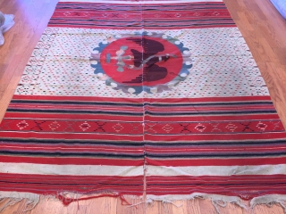 A extremely  rare and very important Saltillo Serape of very fine knotting with subtle tones, which can only be achieved by using naturel dyes.
The center field is flanked by a early  ...