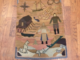A exquisite and rare Grenfell Labrador Industries hooked rug of silk stocking or lingerie early 20th Century.
                