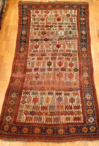 A superb and exquisite collectible carpet in the true and unique tradition of finest Persian  Qashqaii artistry with the character and colors of the early part of the century and of  ...